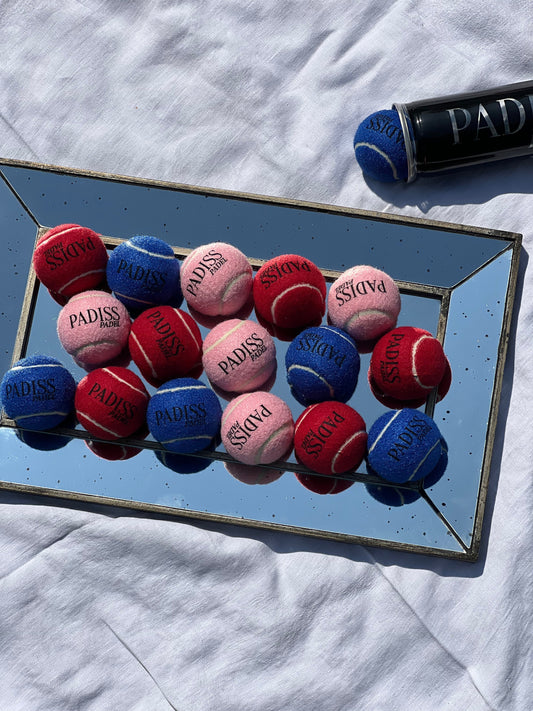 balles de padel PADISS aux couleurs vives (rouge, bleu, rose)
